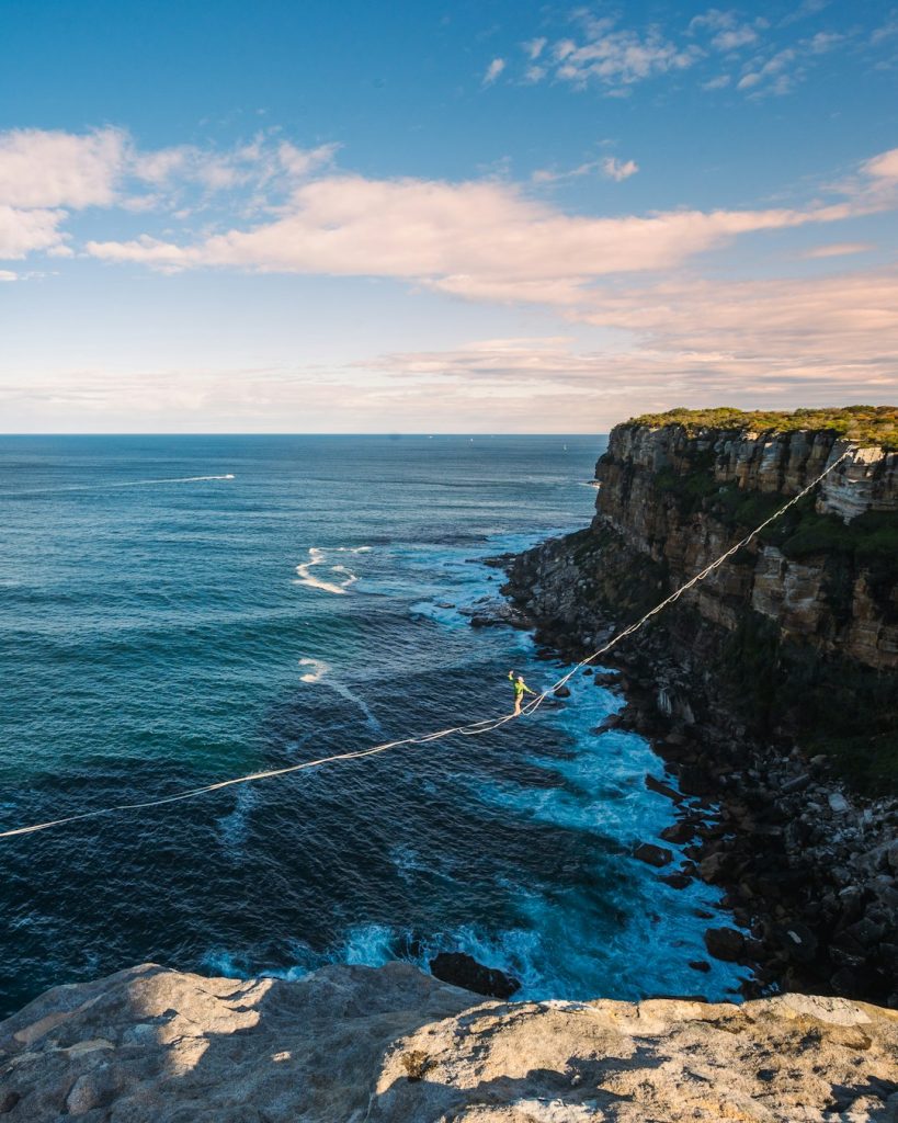 Highlining between the cliffs around the Sydney Region.